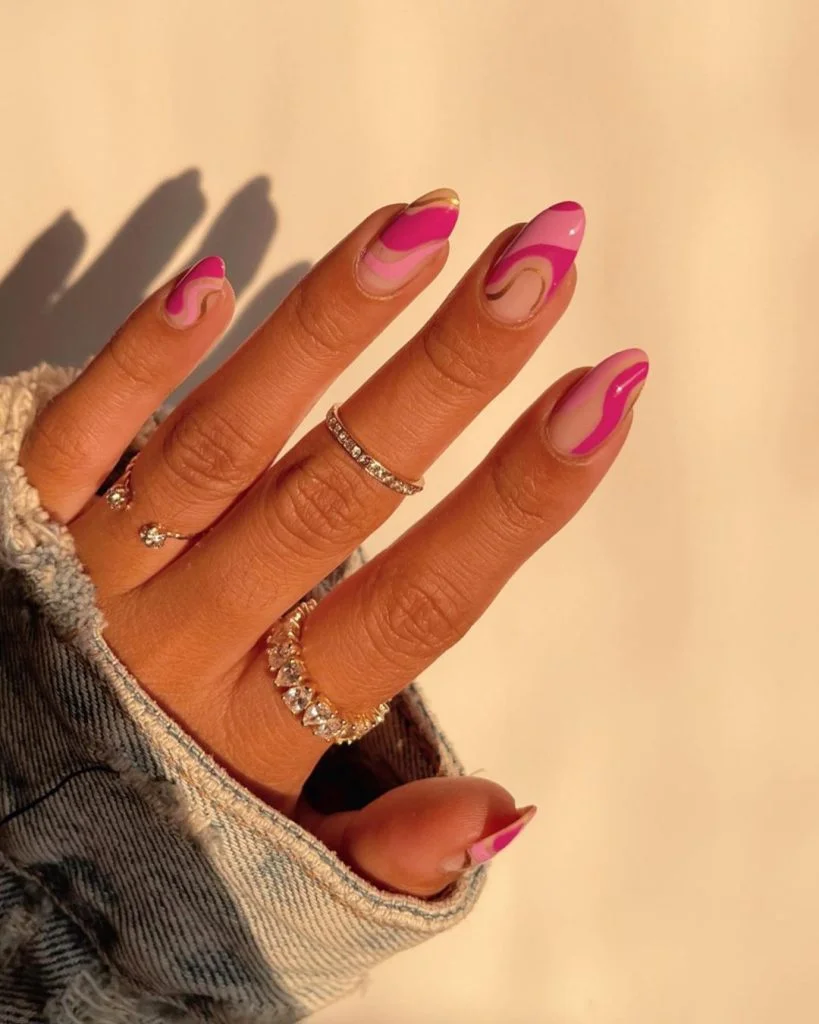 Soft Pink Nails with Subtle Glitter Accents