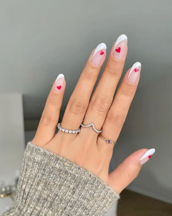 Red and White Nails with a Single Heart Accent