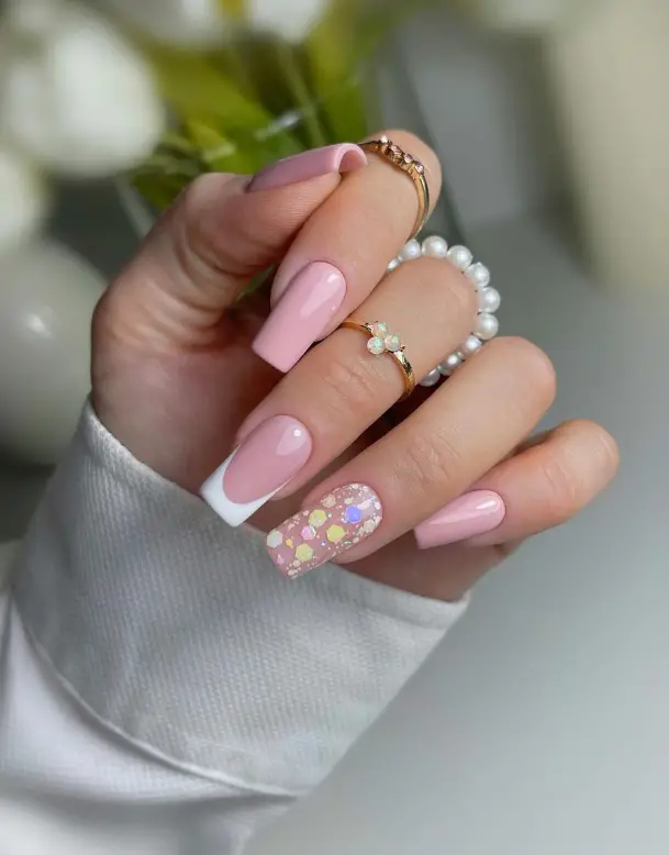 Soft dusty pink ombre nails transitioning into creamy tips