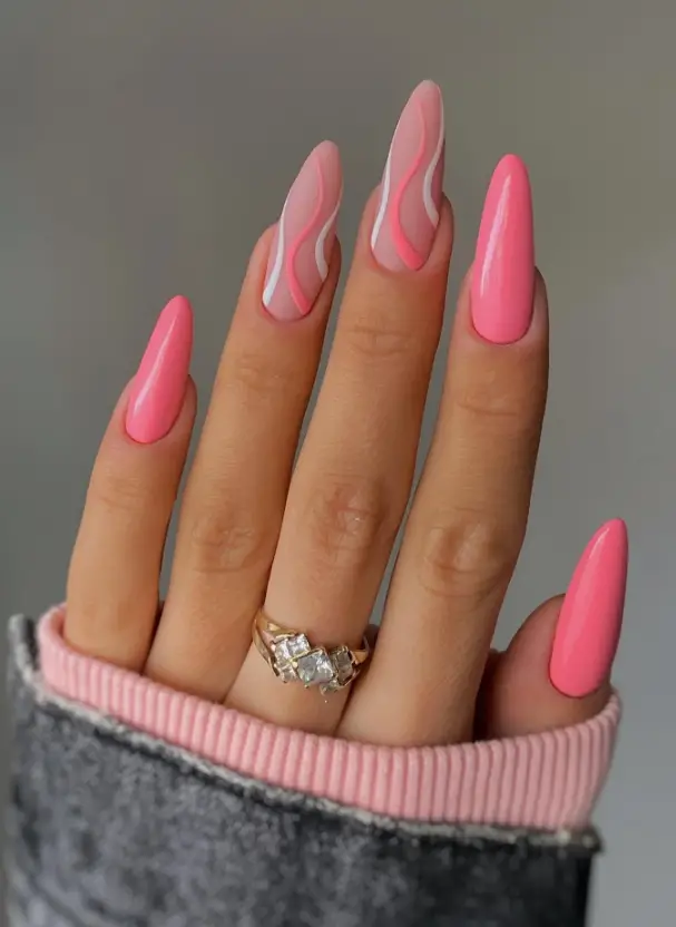 Soft peach gradient nails with shimmering accents