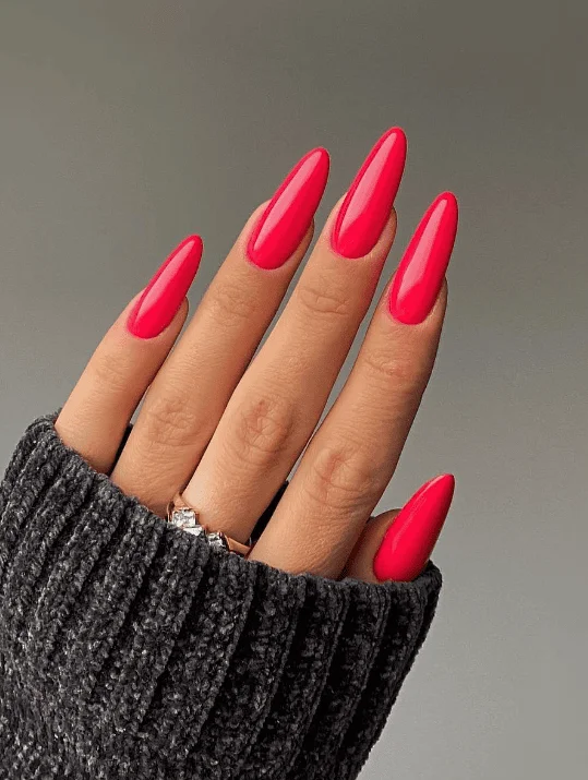 Elegant burgundy nails with gold foil accents for Valentine's Day